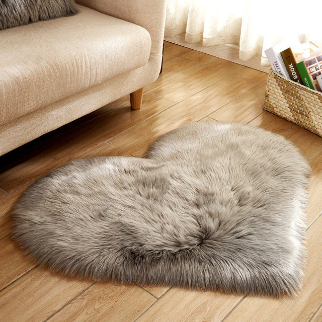 Tapis moelleux en forme de coeur