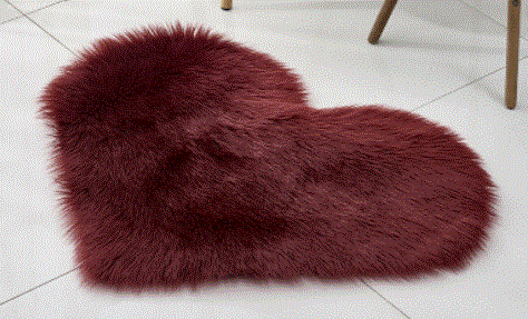 Tapis moelleux en forme de coeur