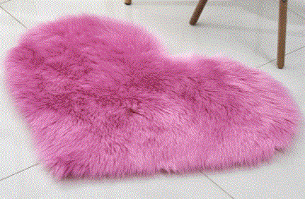 Tapis moelleux en forme de coeur